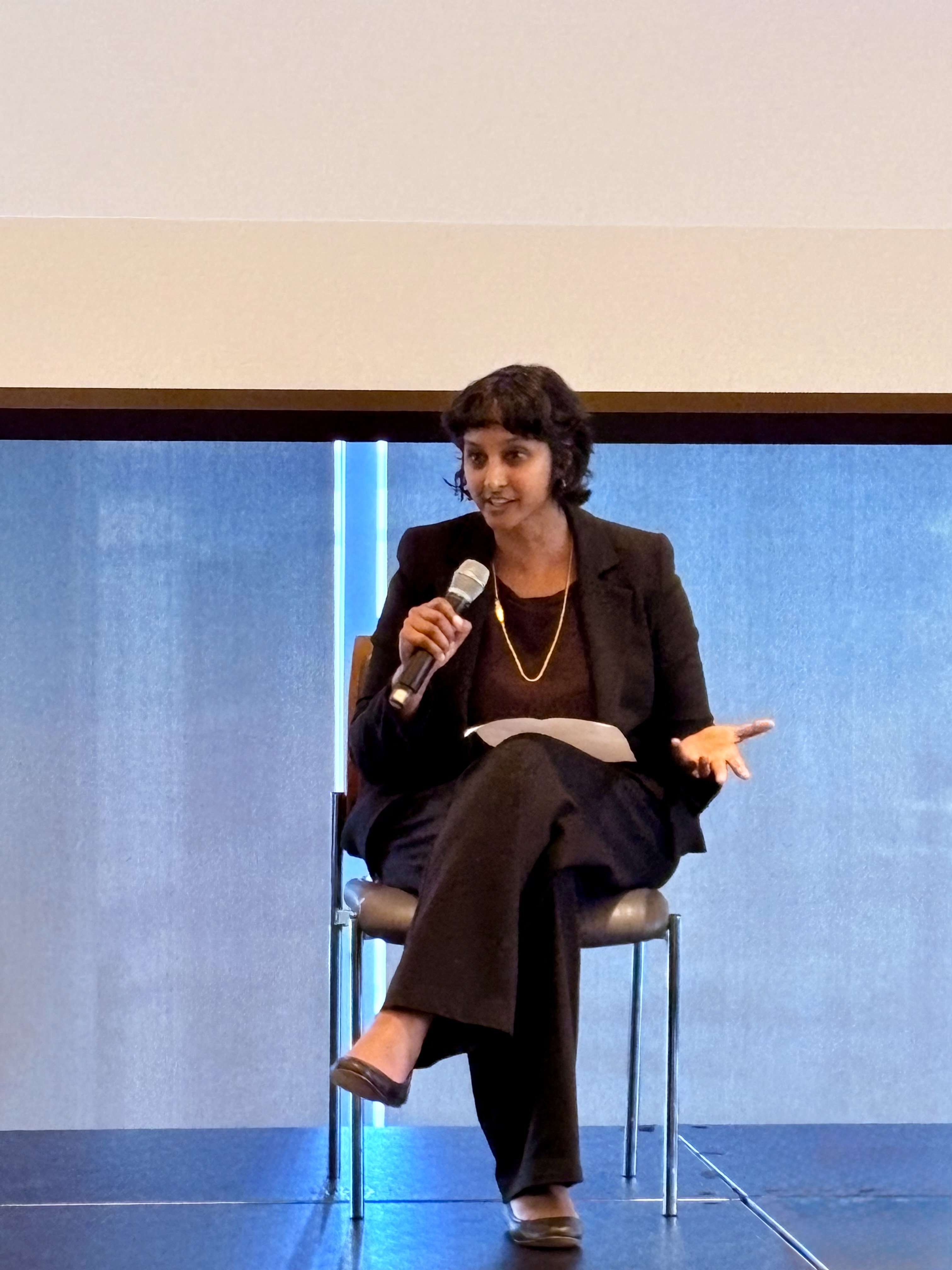 Mytili speaking at forum